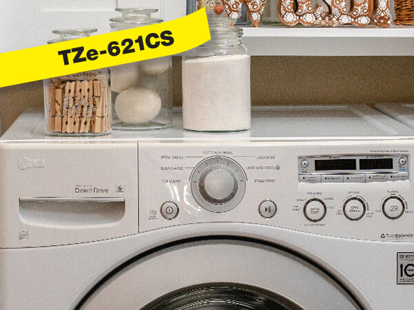 Brother P-touch TZe laminated label tapes on storage jars in laundry room