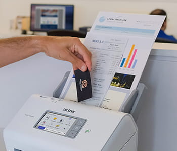 Person using ADS4900W scanner  