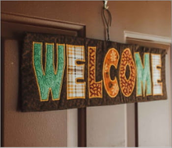 Sewn welcome sign