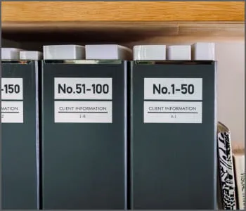 Black binders with templated labels