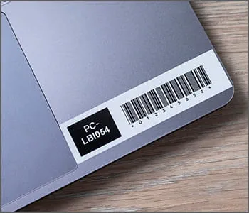 Laptop with barcode printed by a Ptouch label maker