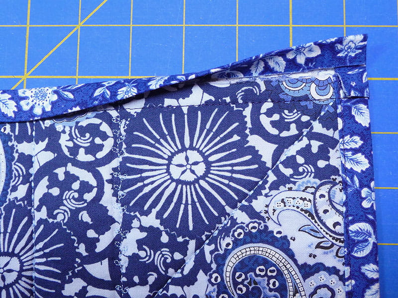 Folded edges of the fabric displaying where they need to be sewn
