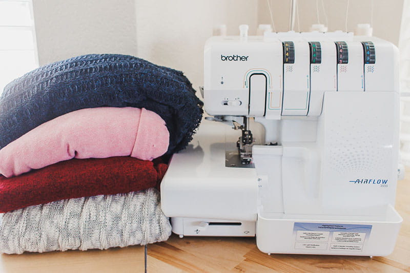 Brother sewing machine with sweater knits on the left