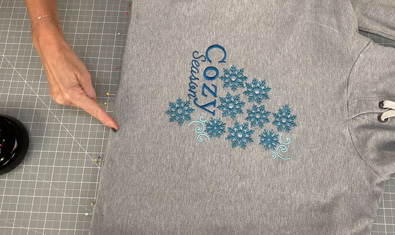 Grey sweatshirt with blue flowers and cozy text