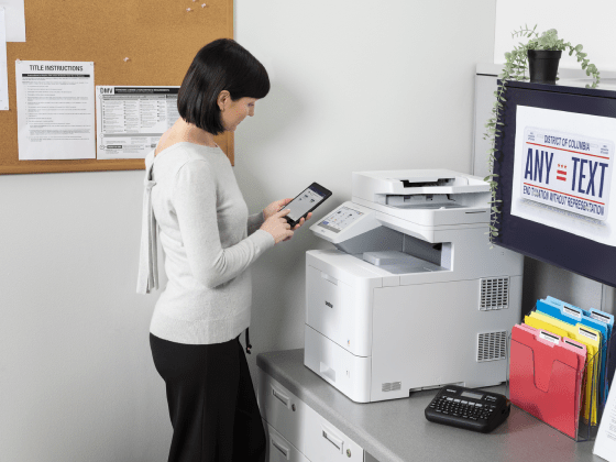 Woman using a brother printer through a mobile device 