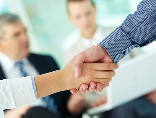 Close-up of a handshake