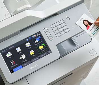 Person scanning badge on MFC-L9570CDW all-in-one printer