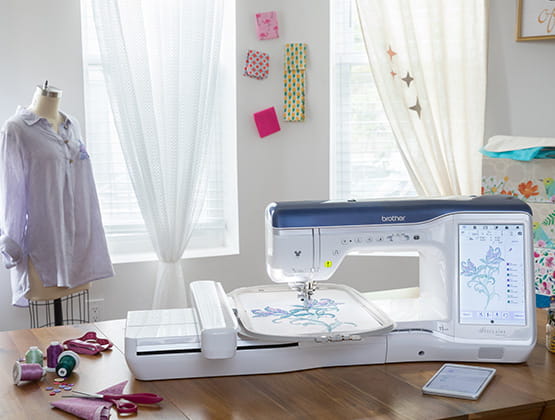 Embroidery machine in a craft room creating a design. 
