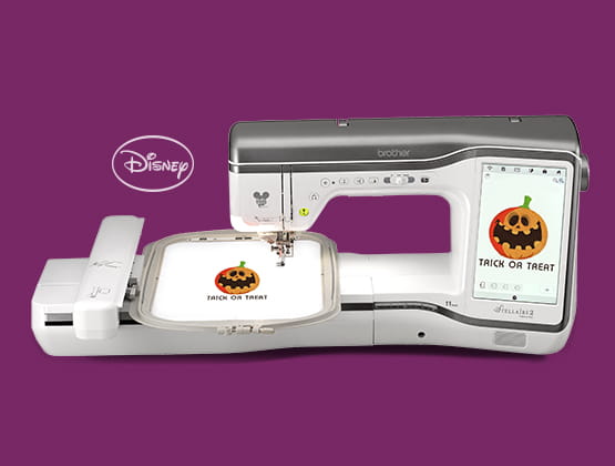 Stellaire2 Innov-ís XJ2 sewing and embroidery machine on purple background with jack-o-lantern on screen.