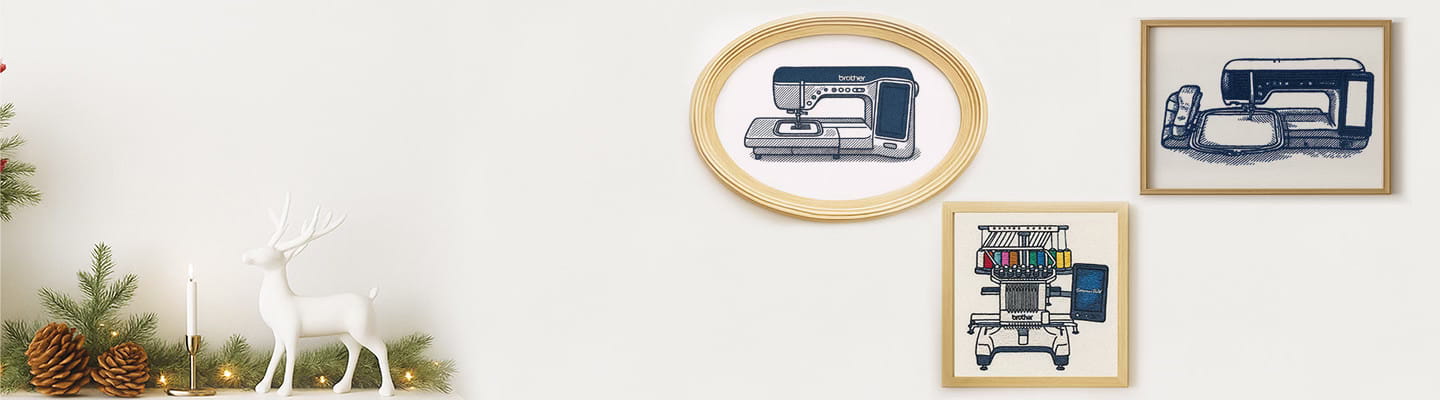 Wall with three framed embroidery of a sewing machine, embroidery machine and a multineedle embroidery machine with holiday theme on the left hand side.