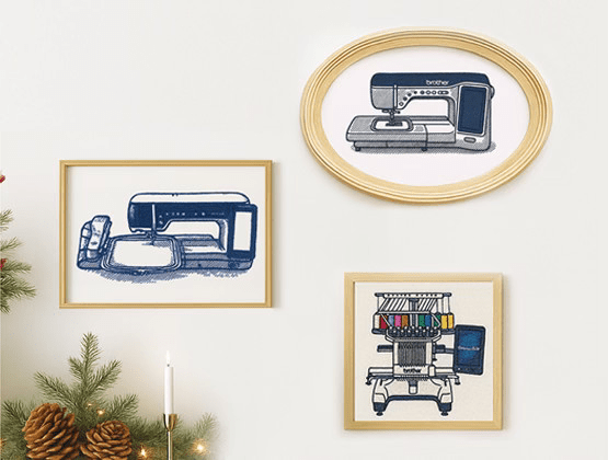Wall with three framed embroidery of a sewing machine, embroidery machine and a multineedle embroidery machine with pine needles and pine cones