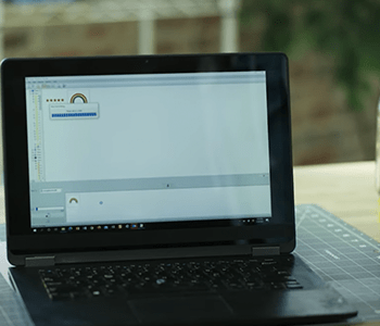 Embroidery design program running on a laptop