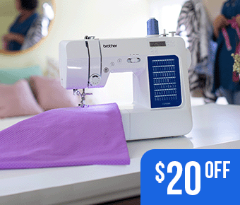 CS7000X sewing machine on a desk with purple fabric on arm with $20 off overlaid.