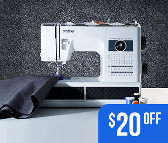 ST371HD sewing machine with a dark gray fabric on arm on a desk with $20 off overlaid