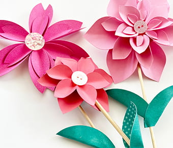 3 paper flowers in shades of pink. Brother Crafts project. 