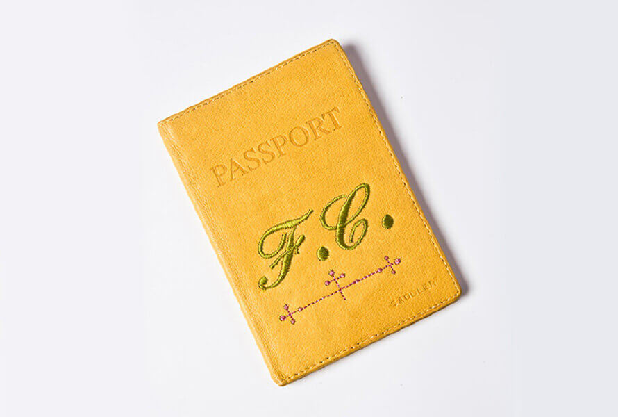 Yellow monogrammed passport cover