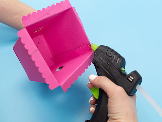 P-touch Embellish Easter Basket project step 2 hot gluing basket together