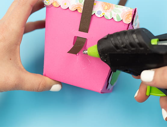 P-touch Embellish Easter Basket project step 9 attaching brown basket handle