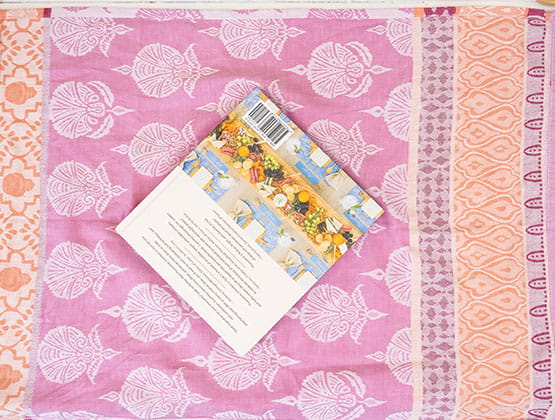 P-touch embellish craft step 1: Square gift placed in center of a tea towel