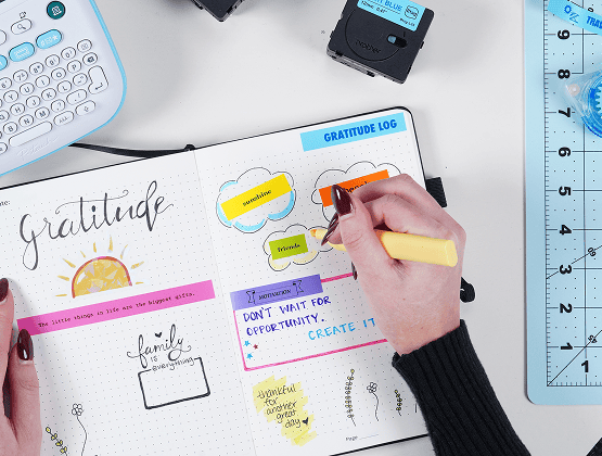 A close-up of the journal spread featuring the Eiffel Tower and map of Paris, decorated with labels and drawings.