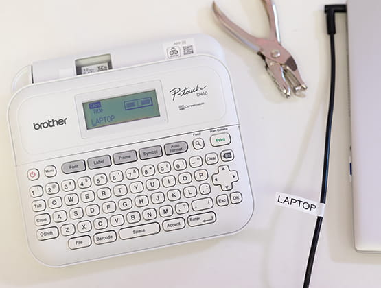 Brother Ptouch Label Maker top view, label on cable displayed on the side