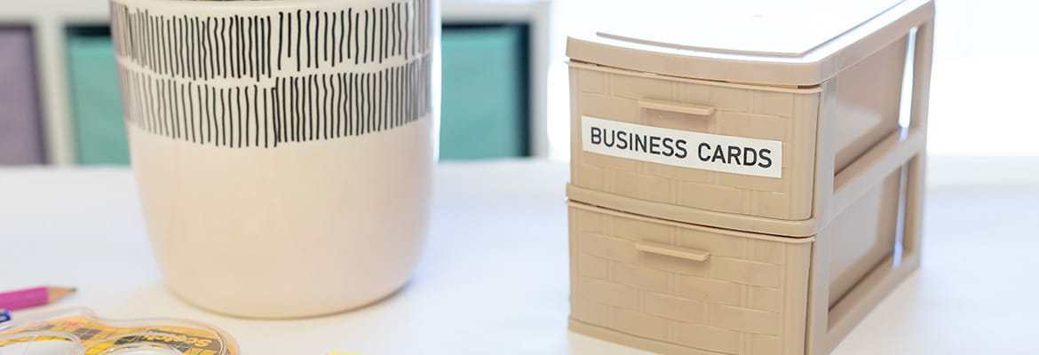 Business card holder with a label printed from Brother Ptouch showing the name Business Cards