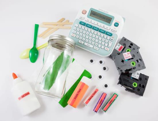 P-touch Embellish label maker, label tapes and slime kit supplies on a blank background