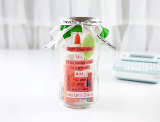 Step 5 - Completed slime kit jar on a table with P-touch Embellish label maker in background.