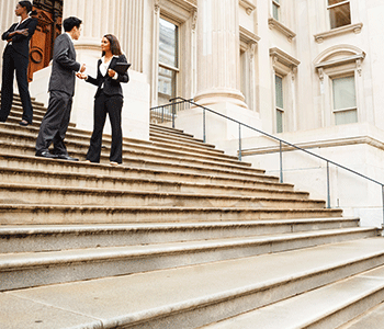 People talking outside on grand staircase