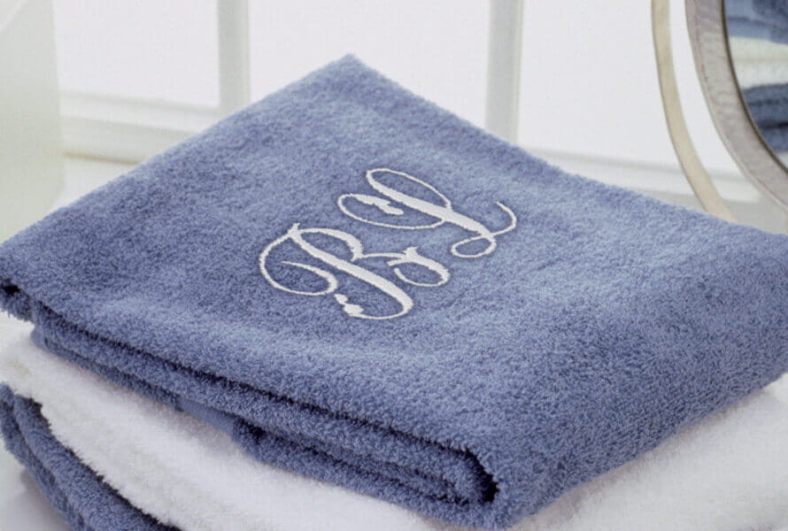 Blue and white hand towels with custom monogramming