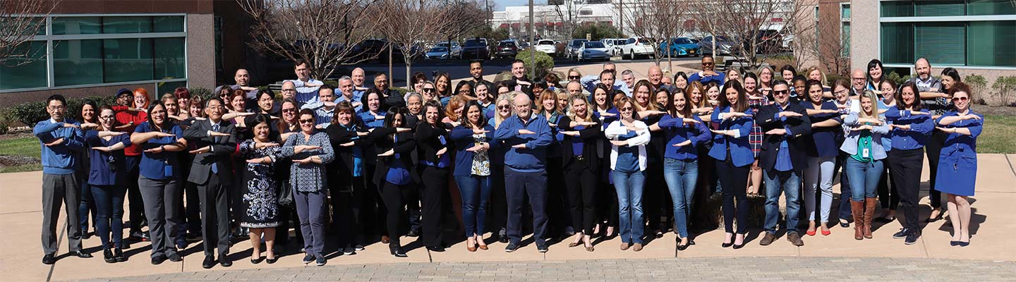 Employee group photo outside