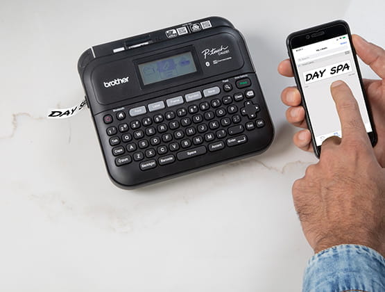 Person printing label from phone to PTD460BT