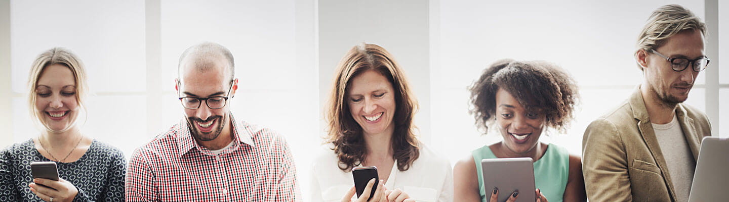 Five Professionals Using Mobile Devices