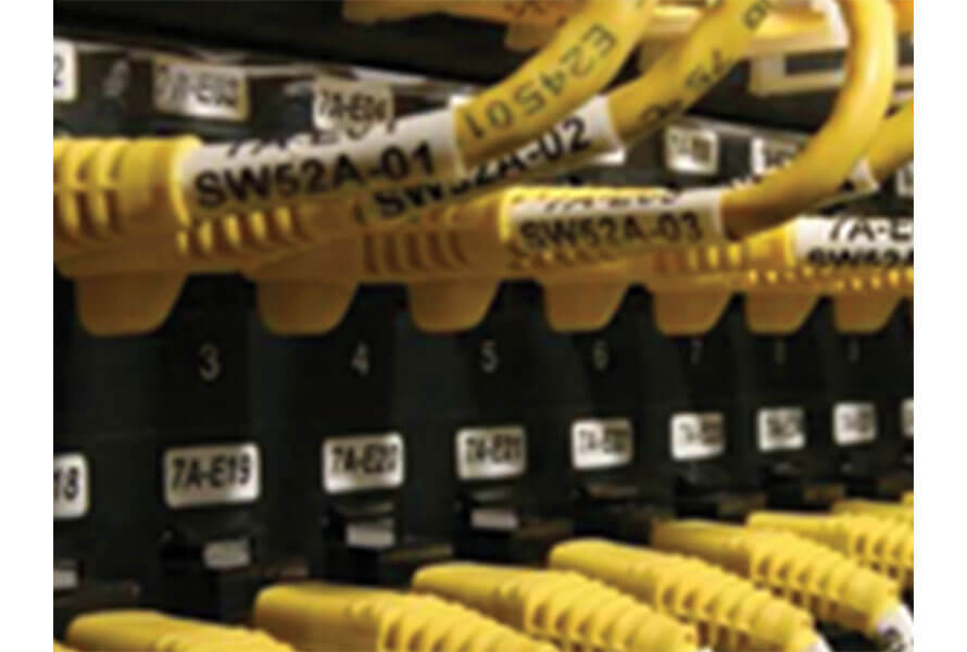 Yellow cables connected to a networking device
