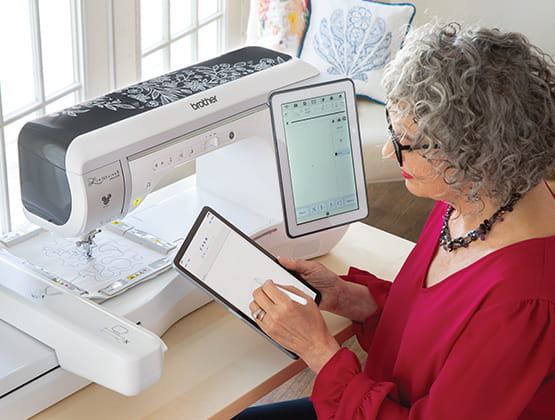 Woman using a tablet with the Artspira app and XP3