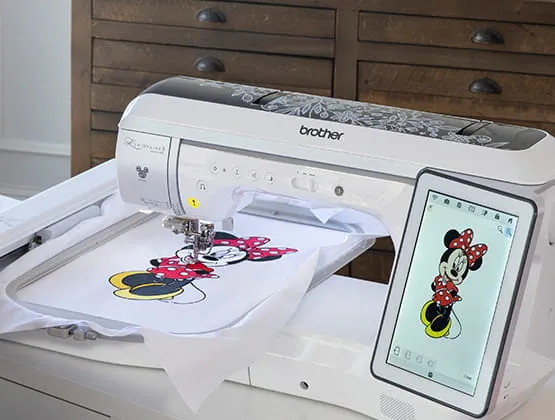 Minnie Mouse design on-screen of XP3 and in embroidery hoop
