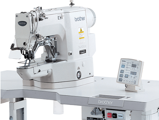 Industrial sewing machine attached to a table workstation
