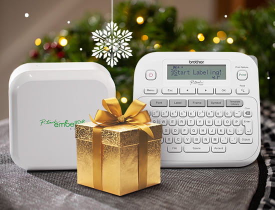 P-touch labelers behind a gold wrapped present