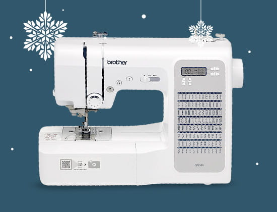 Brother sewing machine with snowflake decoration in background