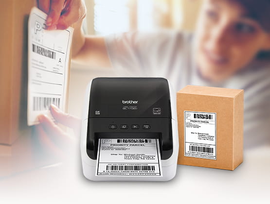 QL1100C in foreground with person affixing label to package in background