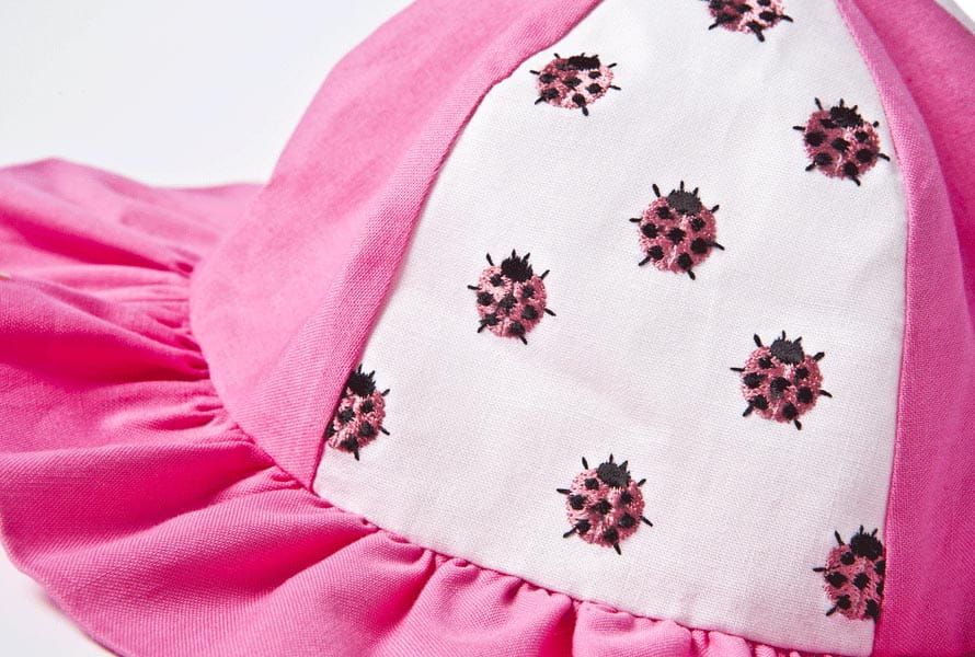 Pink and white lady bug embroidered baby's sun hat
