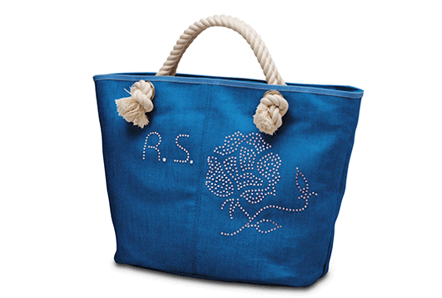 Blue handbag with printable sticker applied