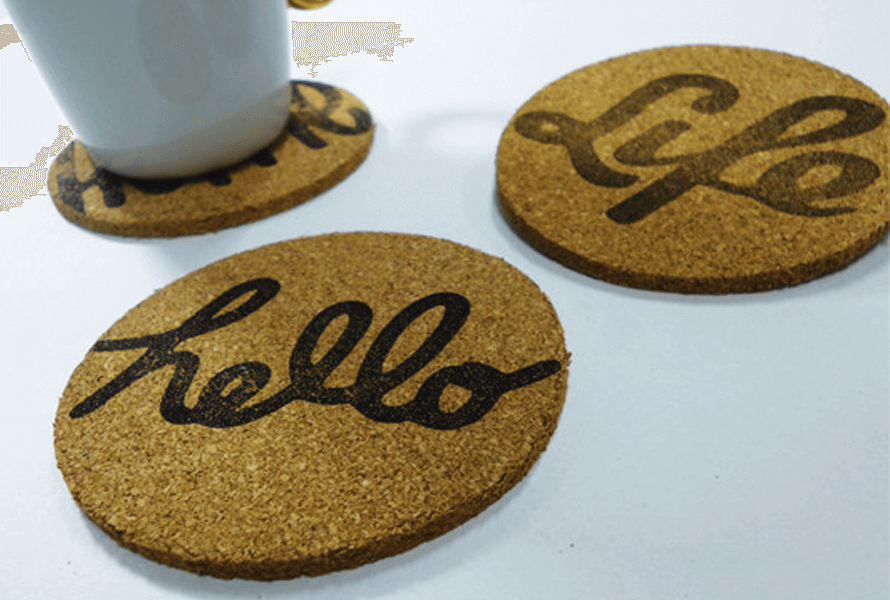 Cork coasters with personalized stamps in cursive