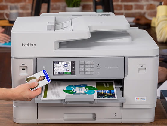 Employee using a Brother Inkjet Printer