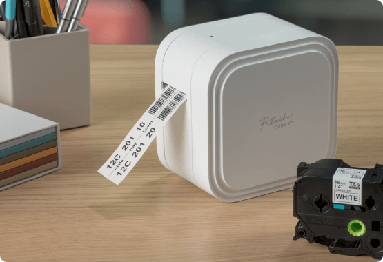 P-touch Cube XP on desk with tape