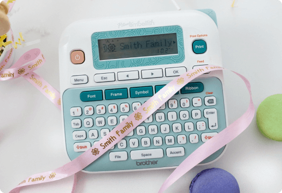 P-touch Embellish with pink ribbon