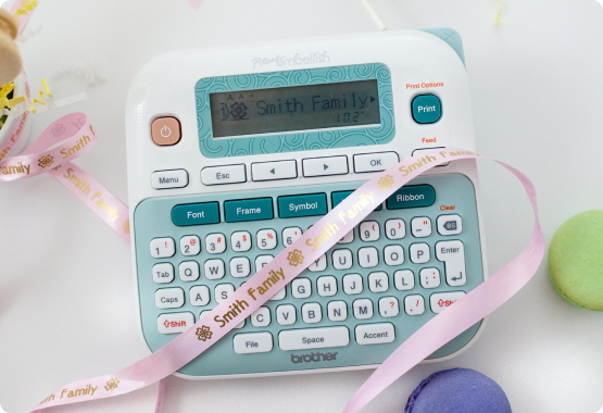 P-touch Embellish with pink ribbon